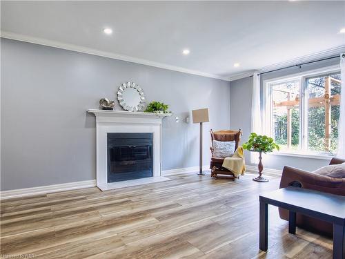 20 Chessington Street, St. Catharines, ON - Indoor Photo Showing Living Room With Fireplace