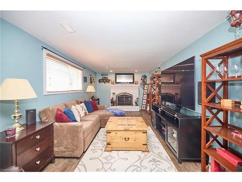 104 Carriage Road, St. Catharines, ON - Indoor Photo Showing Living Room With Fireplace