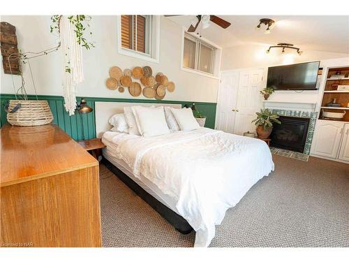 4 Joanna Drive, St. Catharines, ON - Indoor Photo Showing Bedroom With Fireplace