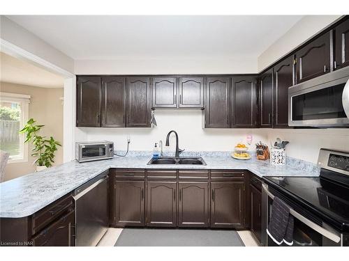 23 Barbican Trail, St. Catharines, ON - Indoor Photo Showing Kitchen With Double Sink