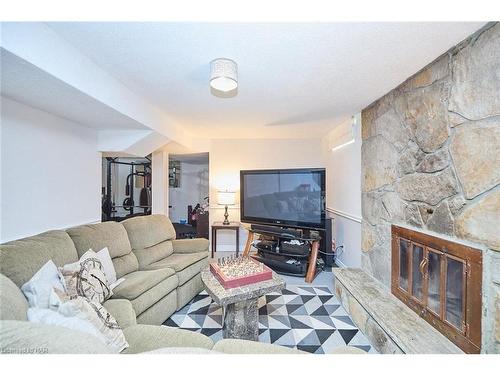 23 Barbican Trail, St. Catharines, ON - Indoor Photo Showing Living Room With Fireplace