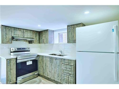 6462 Barker Street, Niagara Falls, ON - Indoor Photo Showing Kitchen With Double Sink