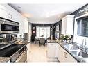 17-121 Glen Morris Drive, St. Catharines, ON  - Indoor Photo Showing Kitchen With Double Sink With Upgraded Kitchen 