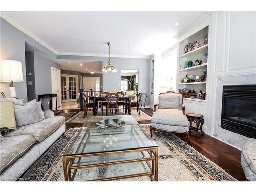 17-121 Glen Morris Drive, St. Catharines, ON - Indoor Photo Showing Living Room With Fireplace