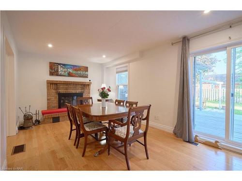 6 Lower Canada Drive, Niagara-On-The-Lake, ON - Indoor Photo Showing Dining Room With Fireplace