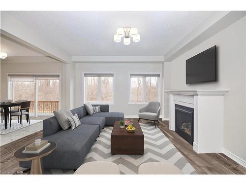 111 Tumblewood Place Place, Welland, ON - Indoor Photo Showing Living Room With Fireplace