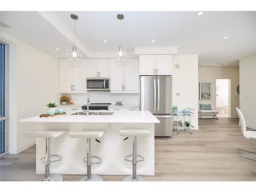 606-118 West Street, Port Colborne, ON - Indoor Photo Showing Kitchen With Stainless Steel Kitchen With Double Sink With Upgraded Kitchen