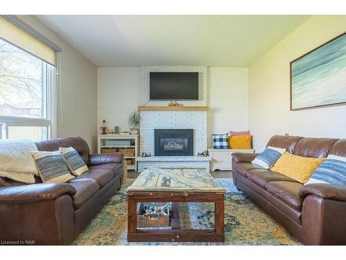 4 Briarsdale Crescent, Welland, ON - Indoor Photo Showing Living Room With Fireplace