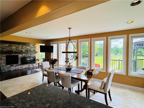 10638 Willoughby Drive, Niagara Falls, ON - Indoor Photo Showing Dining Room With Fireplace