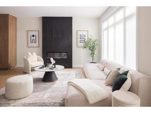 5-205 St Davids Road, Thorold, ON - Indoor Photo Showing Living Room With Fireplace