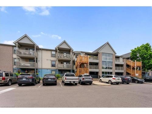 211-2010 Cleaver Avenue, Burlington, ON - Outdoor With Balcony With Facade