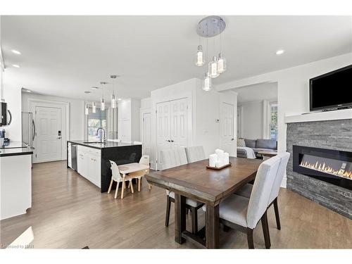 11 Shelley Avenue, St. Catharines, ON - Indoor Photo Showing Dining Room With Fireplace