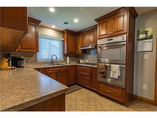 10576 Woodland Dr Drive, Port Colborne, ON - Indoor Photo Showing Kitchen With Double Sink