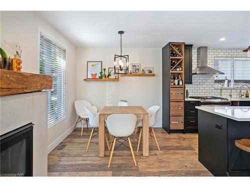 35 Loraine Drive, St. Catharines, ON - Indoor Photo Showing Dining Room With Fireplace