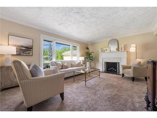 11 Elm Ridge Drive, St. Catharines, ON - Indoor Photo Showing Living Room With Fireplace