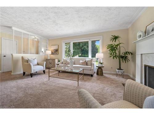 11 Elm Ridge Drive, St. Catharines, ON - Indoor Photo Showing Living Room With Fireplace