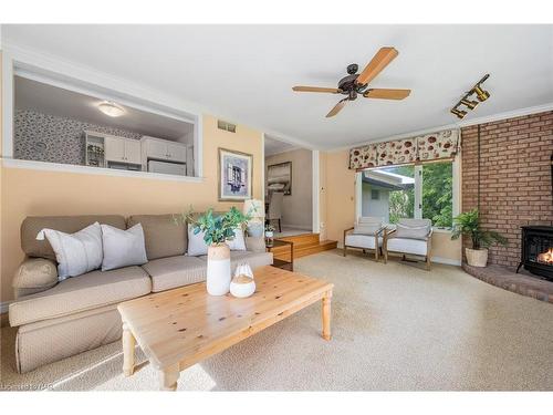 11 Elm Ridge Drive, St. Catharines, ON - Indoor Photo Showing Living Room With Fireplace