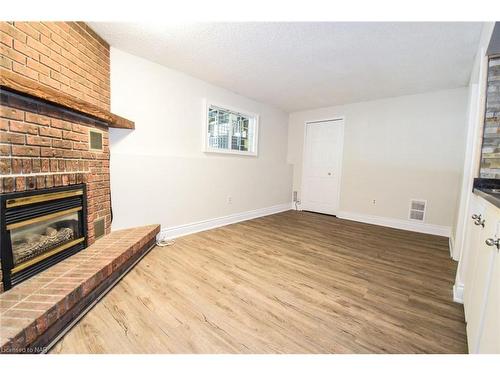 26-178 Scott Street, St. Catharines, ON - Indoor Photo Showing Living Room With Fireplace