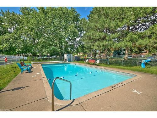 201-196 Scott Street, St. Catharines, ON - Outdoor With In Ground Pool With Backyard