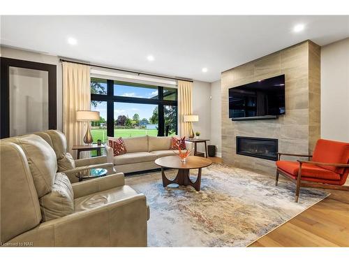 45 Peach Tree Common, St. Catharines, ON - Indoor Photo Showing Living Room With Fireplace