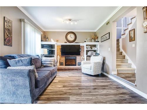 95 St Augustine Drive, St. Catharines, ON - Indoor Photo Showing Living Room With Fireplace