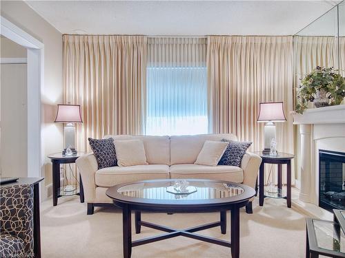 111 Lake Street, St. Catharines, ON - Indoor Photo Showing Living Room With Fireplace