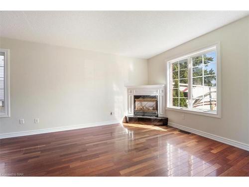 32 Mcnamara Street, Thorold, ON - Indoor Photo Showing Living Room With Fireplace