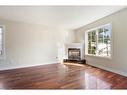 32 Mcnamara Street, Thorold, ON  - Indoor Photo Showing Living Room With Fireplace 