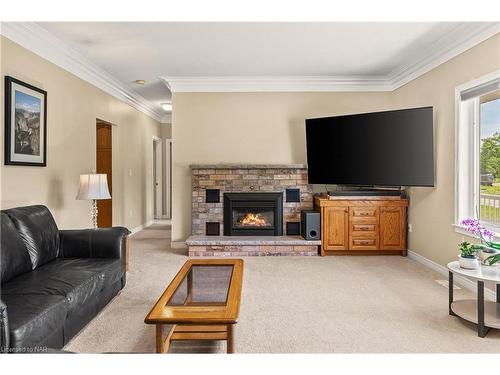 2170 Houck Crescent, Fort Erie, ON - Indoor Photo Showing Living Room With Fireplace