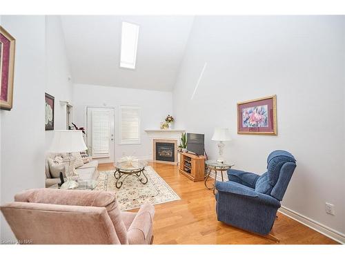 10-8142 Costabile Drive, Niagara Falls, ON - Indoor Photo Showing Living Room With Fireplace