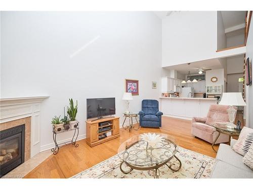 10-8142 Costabile Drive, Niagara Falls, ON - Indoor Photo Showing Living Room With Fireplace