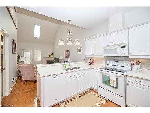 10-8142 Costabile Drive, Niagara Falls, ON - Indoor Photo Showing Kitchen With Double Sink