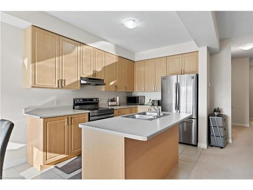 4861 Pettit Avenue, Niagara Falls, ON - Indoor Photo Showing Kitchen With Stainless Steel Kitchen With Double Sink