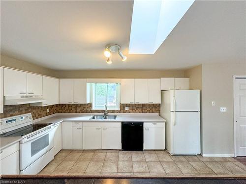 46 Margery Avenue, St. Catharines, ON - Indoor Photo Showing Kitchen With Double Sink