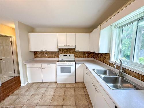 46 Margery Avenue, St. Catharines, ON - Indoor Photo Showing Kitchen With Double Sink