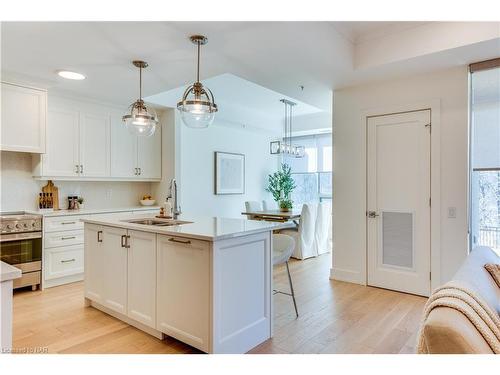 102-77 Yates Street, St. Catharines, ON - Indoor Photo Showing Kitchen With Double Sink