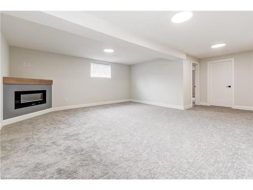 64 Hickory Court, Port Colborne, ON - Indoor Photo Showing Other Room With Fireplace