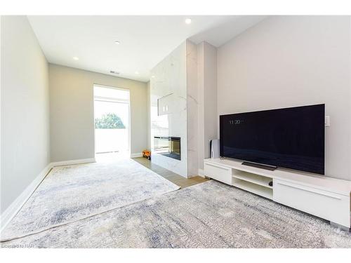 403-71 Wyndham Street S, Guelph, ON - Indoor Photo Showing Living Room With Fireplace