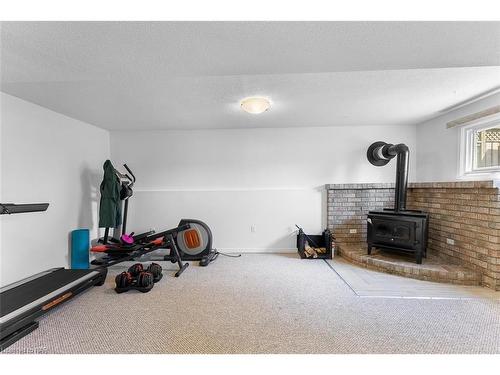 6840 Sunrise Court, Niagara Falls, ON - Indoor Photo Showing Other Room With Fireplace