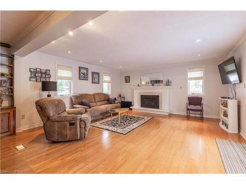 4348 Mitchell Avenue, Niagara Falls, ON - Indoor Photo Showing Living Room With Fireplace