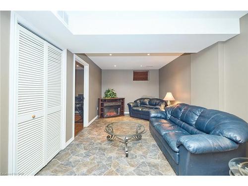 28 Flynn Court, St. Catharines, ON - Indoor Photo Showing Living Room With Fireplace