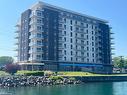 704-118 West Street, Port Colborne, ON  - Outdoor With Body Of Water With Balcony With Facade 