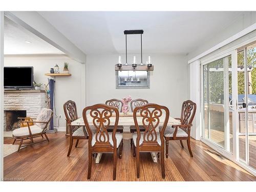 12 Corbett Avenue, St. Catharines, ON - Indoor Photo Showing Dining Room With Fireplace