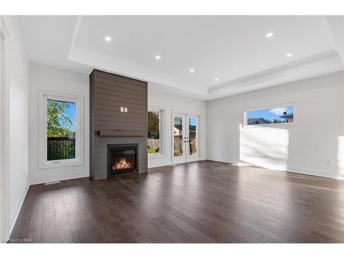 203 Elmwood Avenue, Fort Erie, ON - Indoor Photo Showing Living Room With Fireplace