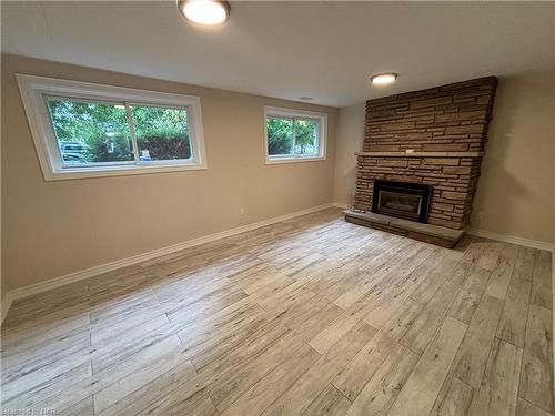 96 Leaside Drive, St. Catharines, ON - Indoor Photo Showing Living Room With Fireplace