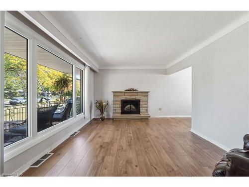 8791 Parliament Avenue, Niagara Falls, ON - Indoor Photo Showing Living Room With Fireplace