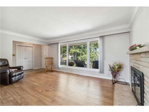 8791 Parliament Avenue, Niagara Falls, ON - Indoor Photo Showing Living Room With Fireplace