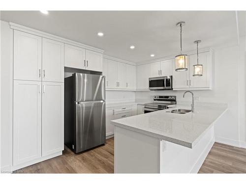 401-300 Fourth Avenue, St. Catharines, ON - Indoor Photo Showing Kitchen With Stainless Steel Kitchen With Double Sink With Upgraded Kitchen