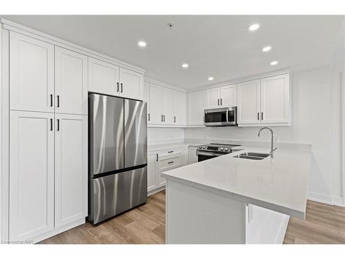 501-300 Fourth Avenue, St. Catharines, ON - Indoor Photo Showing Kitchen With Stainless Steel Kitchen With Double Sink With Upgraded Kitchen