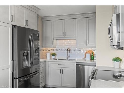 1202-15 Towering Heights Boulevard, St. Catharines, ON - Indoor Photo Showing Kitchen With Stainless Steel Kitchen With Double Sink